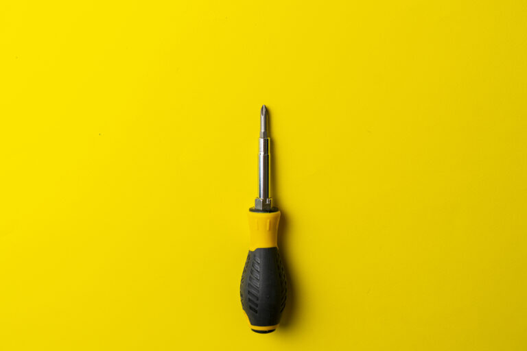 a black and yellow screwdriver isolated, repair tool equipment