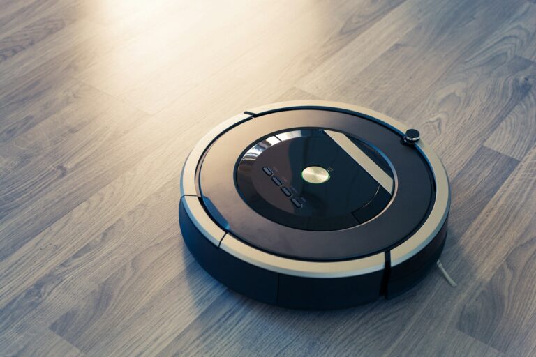 robotic vacuum cleaner on laminate wood floor smart cleaning tec