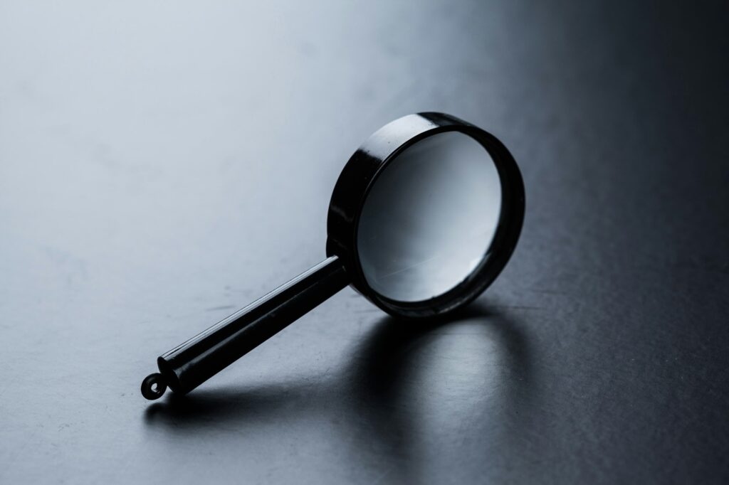 magnifying glass on dark background